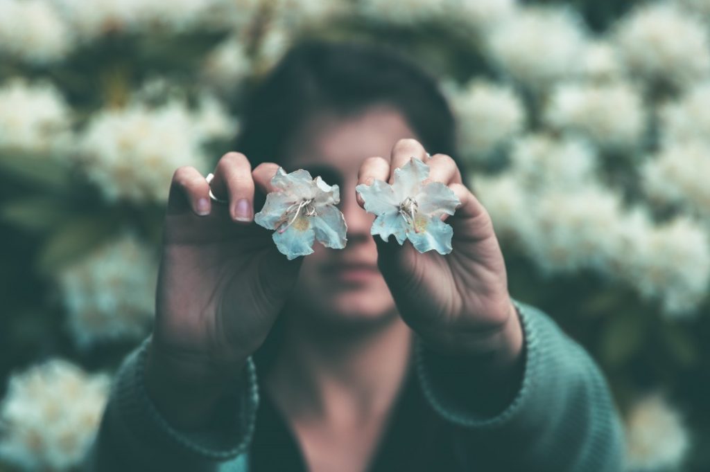 Excited Man with Flowers